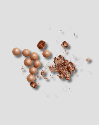 Opaliserende bronzing parelpoeder voor alle huidtypes met een zonovergoten effect van Gosh - 2