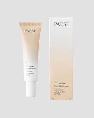 Subtiel oplichtende kleur corrigerende DD-crème met SPF 30 in de kleur 2W beige van Paese - 1