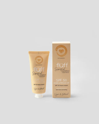 Gezichtscrème met zonnebrand SPF 50 om de huidtint te egaliseren Pluisjes